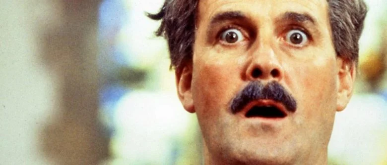 John Cleese Gets Schooled on Wild Trump Assassination Theory